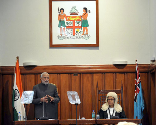 Modi being received on his arrival, at Nausori International Airport