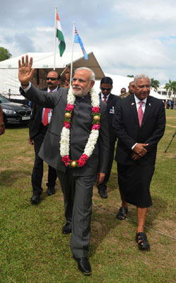 Modi being received on his arrival, at Nausori International Airport