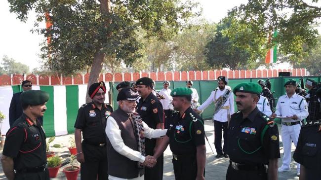 Narendra Modi with the soldiers at the Dograi War Memorial