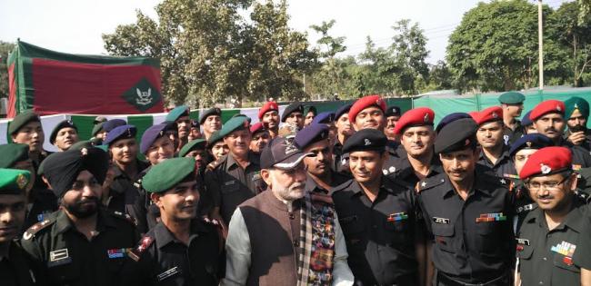 Narendra Modi with the soldiers at the Dograi War Memorial
