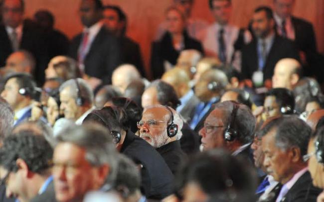 Narendra Modi being received by the President of France