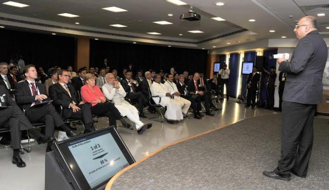 Narendra Modi and the German Chancellor, Dr. Angela Merkel visiting the Robert Bosch Engineering & Innovation Centre, in Bengaluru