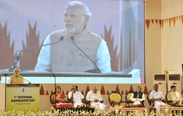 Narendra Modi being received by the Governor of Tamil Nadu