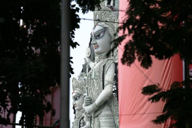 Tallest Durga: People take a peek through opening
