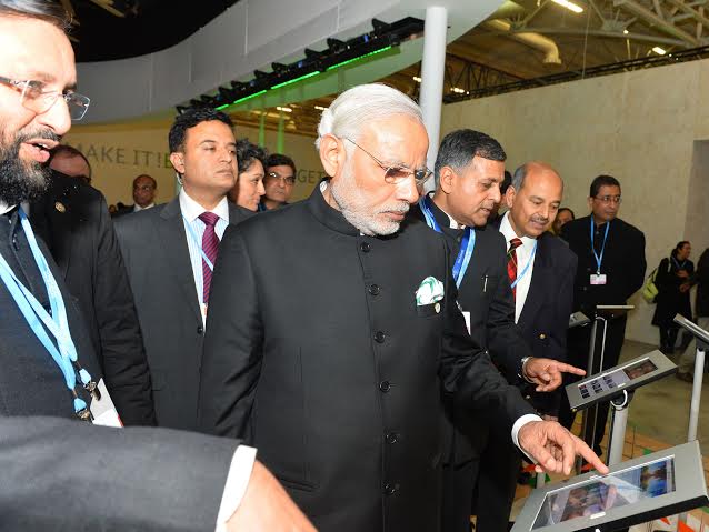 Narendra Modi being received by the President of France