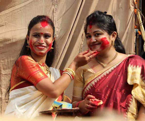 Revellers bid adieu to Goddess Durga on Maha Dashami