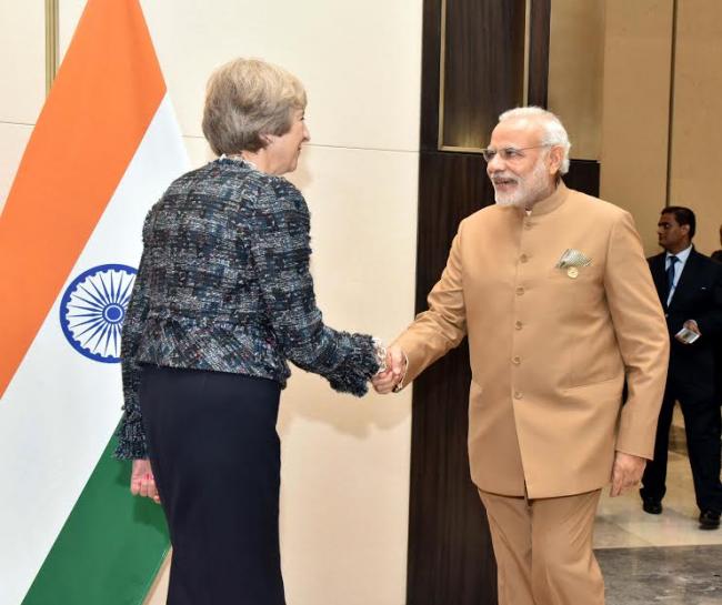 Narendra Modi meeting the Prime Minister of United Kingdom