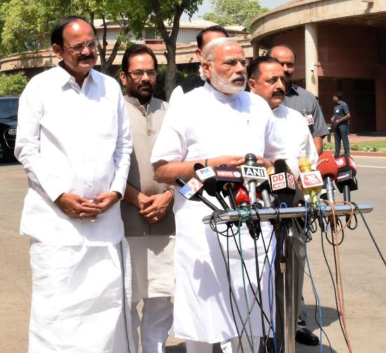  Narendra Modi delivering statement to the media outside the Parliament House