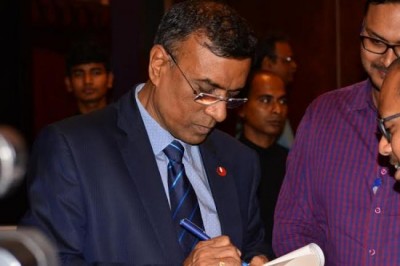 Amit Mitra releases book on Bandhan Bank