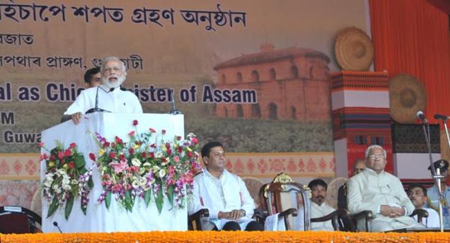 Narendra Modi being received by the Governor of Assam