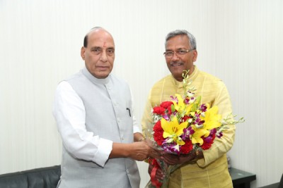 Rajnath Singh meets Uttarakhand CM, wishes him success
