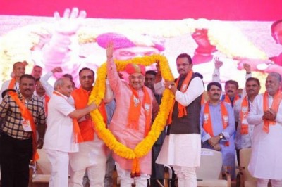 BJP chief Amit Shah returns to hero's welcome in Gujarat 