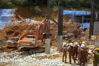 Landslide at Malaysian constructions site leaves three dead, search and rescue continues 
