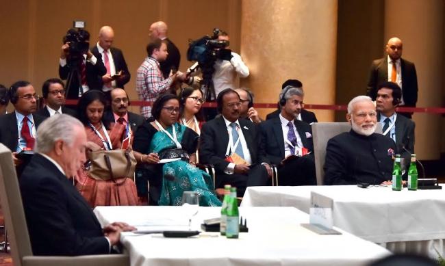 Narendra Modi being welcomed by the German Chancellor