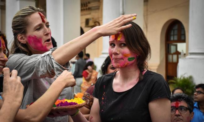 Foreigners soak in Holi spirit in India