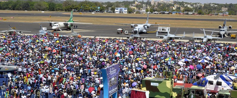 Visitors witness the last day of Aero India Show