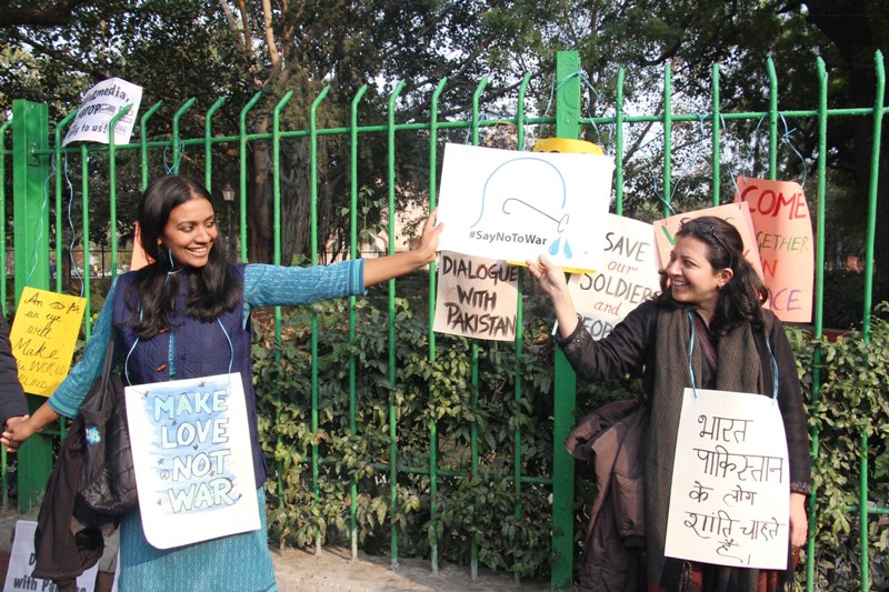 Members of Citizen Against War form human chain for peace