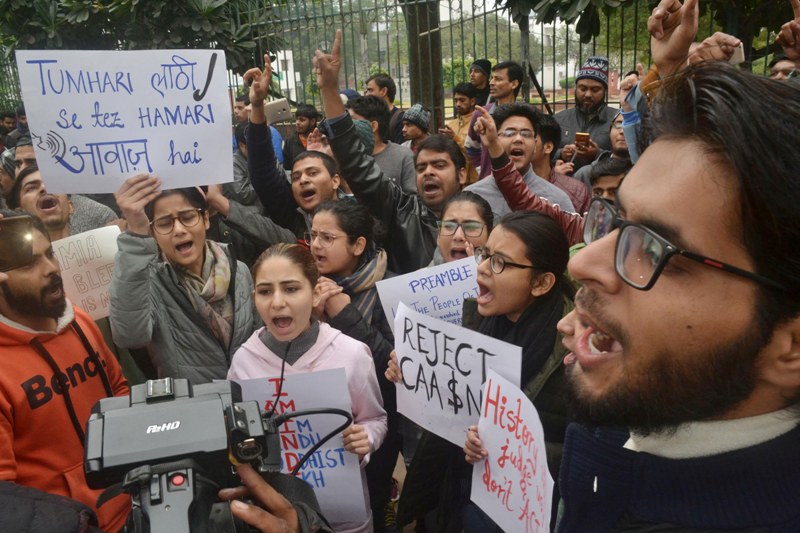 Students agitating against Citizenship Amendment Act  outside Jamia Millia Islamia University.