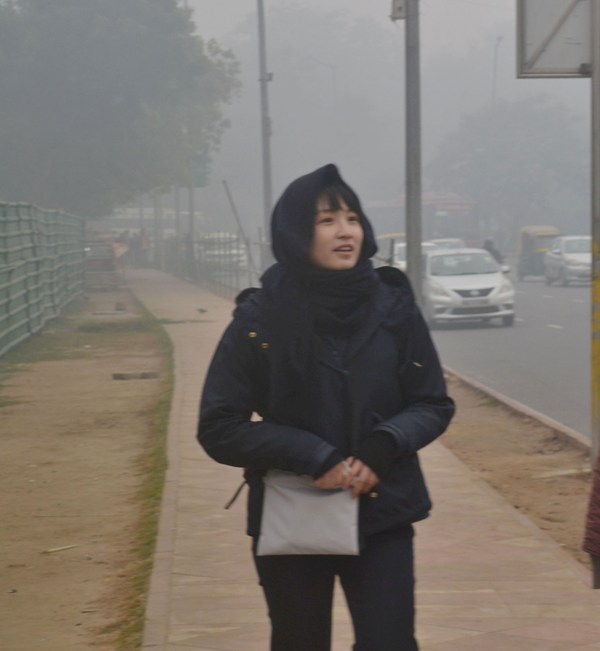 Visitors wrap themselves in warm clothes in New Delhi