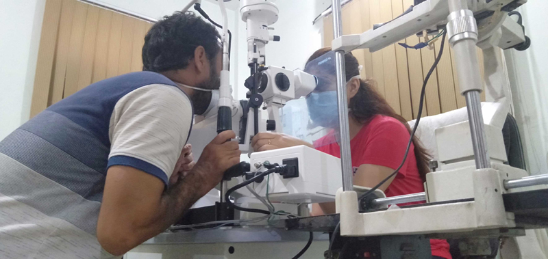 Cornea transplant specialist Dr Ghazal Pushp treating a patient