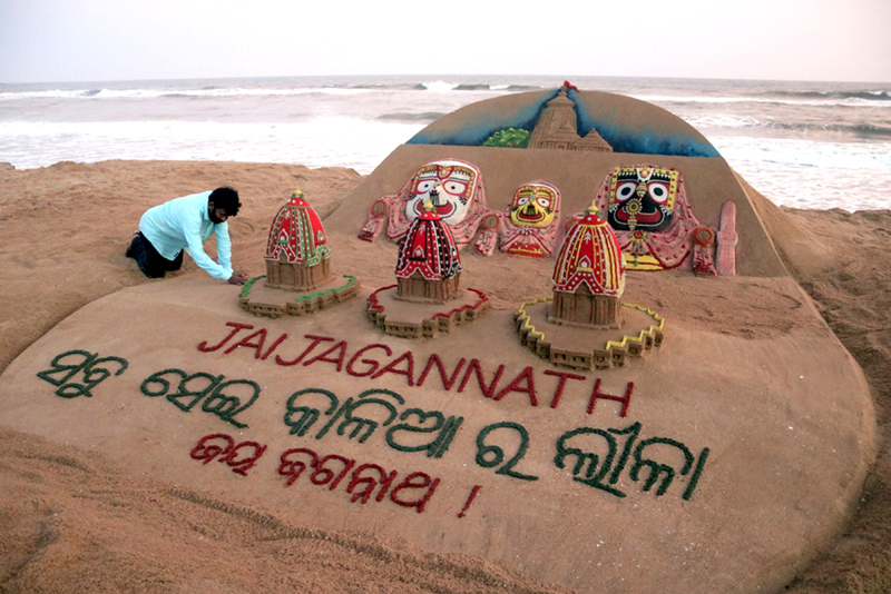 Sculpture of Lord Jagannath, Balabhadra and Subhadra at Puri beach