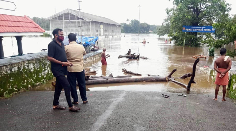 A view of roads in Aluva town submerged under water