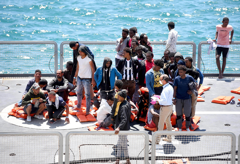 Migrants arrive at the Boiler Wharf in Senglea