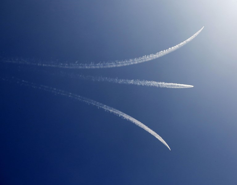 Three Sukhoi fighter aircraft fly past National War Memorial marking the beginning of Golden Jubilee of India's victory over Pakistan