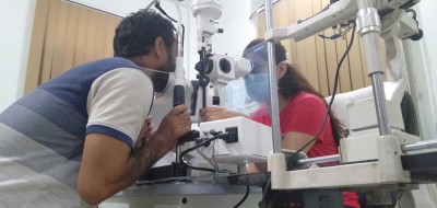 Cornea transplant specialist Dr Ghazal Pushp treating a patient