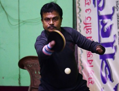 Disabled table tennis player Kajol Dey with his students on International Day of Persons with Disabilities in Agartala