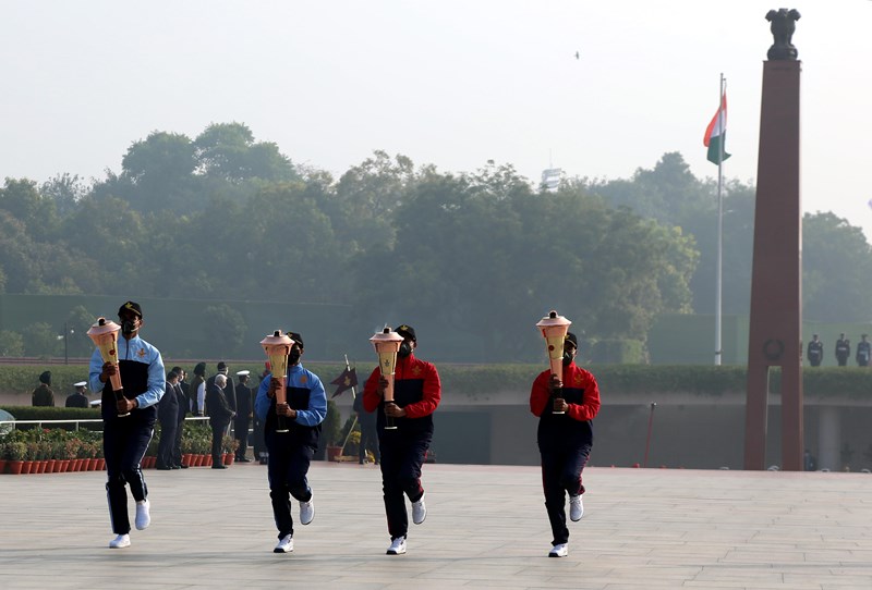 Soldiers carrying victory flames, lit-up by PM Modi, marking the beginning of Golden Jubilee of India's victory over Pakistan in Indo-Pak War