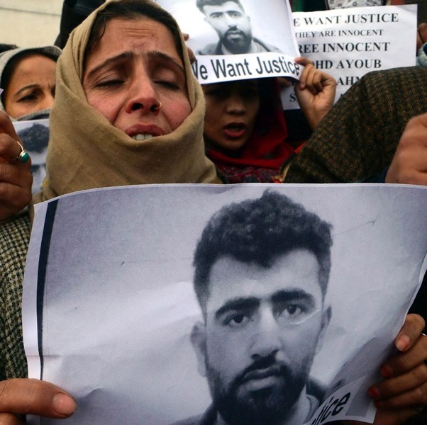 Family members of men arrested by Delhi Police protest in Srinagar