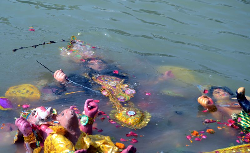 Glimpses of immersion of Goddess Durga's idols at Kolkata's Babughat