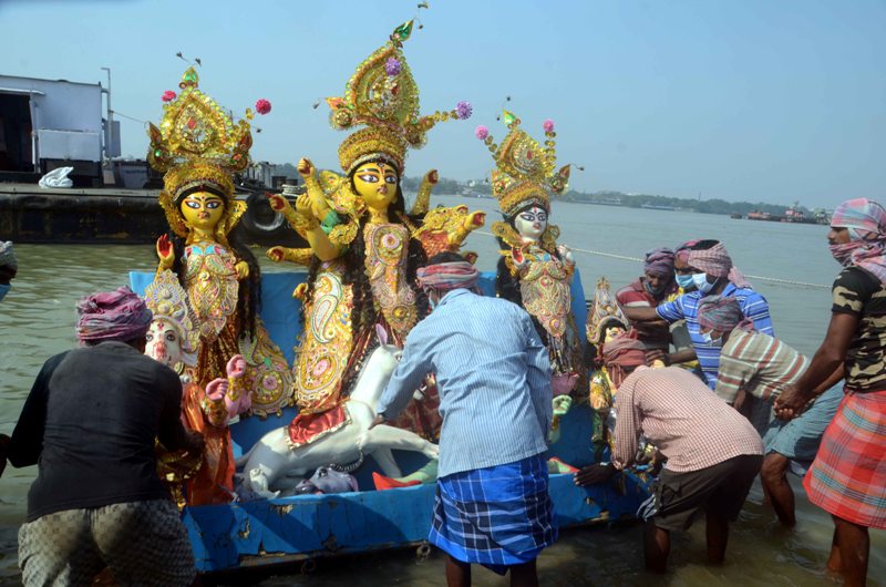 Glimpses of immersion of Goddess Durga's idols at Kolkata's Babughat