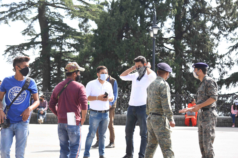 People enjoy weather in Shimla