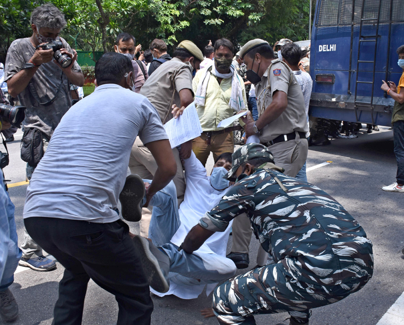 Indian Youth Congress activists demonstrate outside Rajnath Singh residence