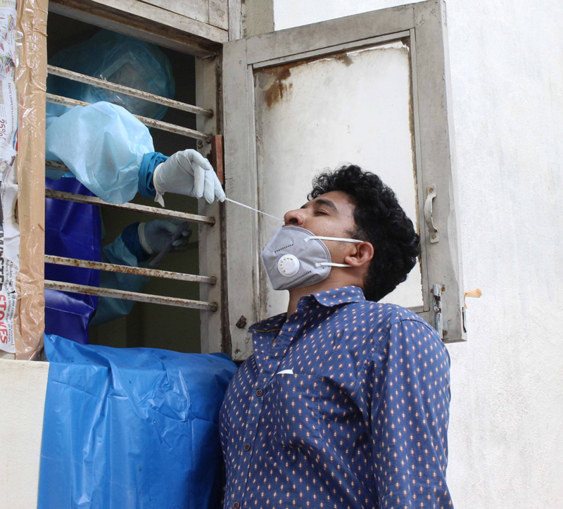 Health workers taking swabs for Covid-19 test in Secunderabad,Telangana