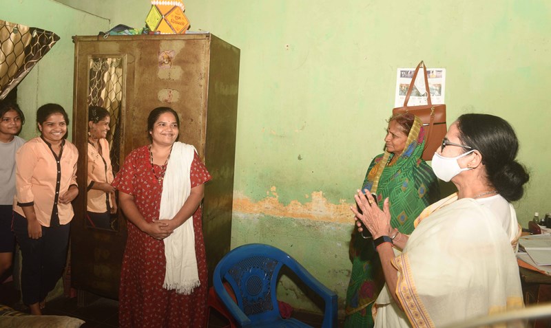 Mamata Banerjee meets a family during her visit in Goa