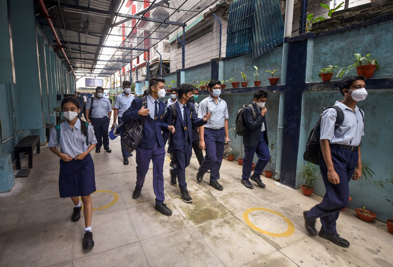 Glimpses of students attending physical classes in Kolkata as West Bengal schools reopen from today