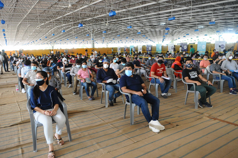 New Delhi: People wear protective masks