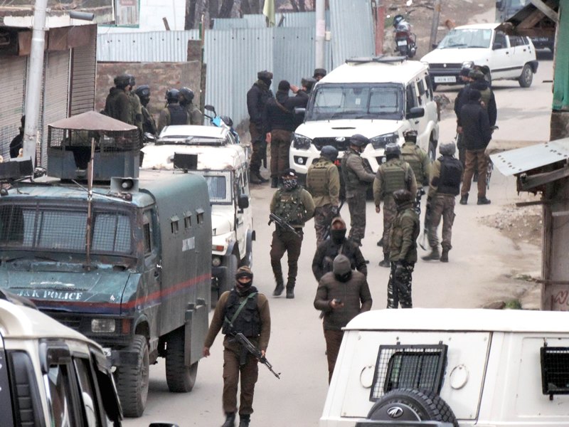 Security forces during an encounter at Gousu Hazratbal in Kashmir