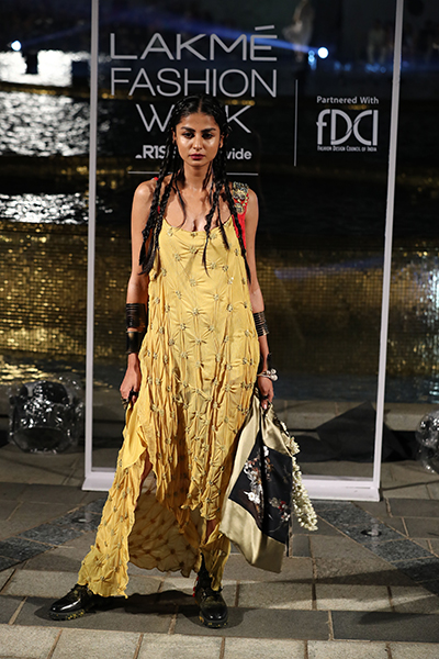 Models showcase designer Anamika Khanna's line of clothing at the Lakme Fashion Week