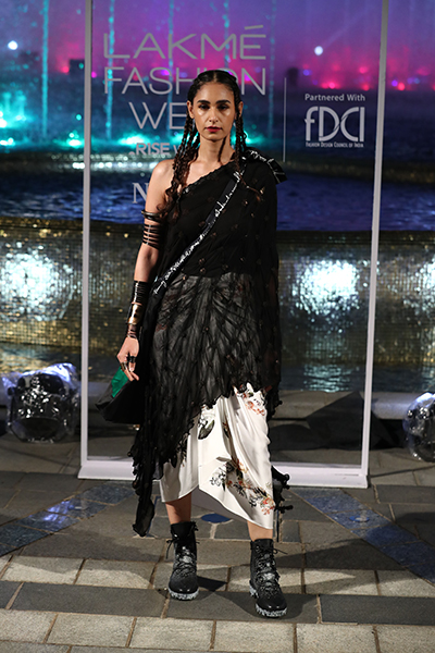 Models showcase designer Anamika Khanna's line of clothing at the Lakme Fashion Week