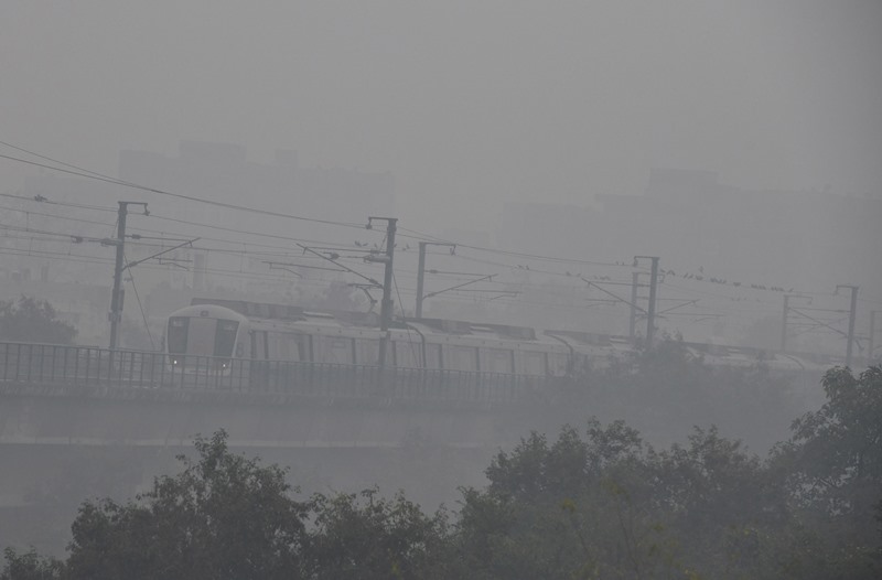Low visibility in Delhi from winter drizzle
