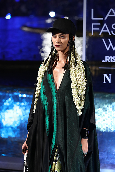 Models showcase designer Anamika Khanna's line of clothing at the Lakme Fashion Week