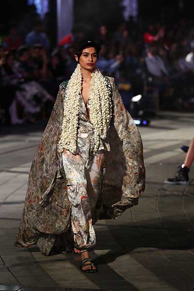 Models showcase designer Anamika Khanna's line of clothing at the Lakme Fashion Week