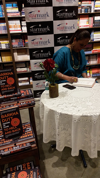 Barkha Dutt signs her latest book To Hell And Back in Starmark Kolkata