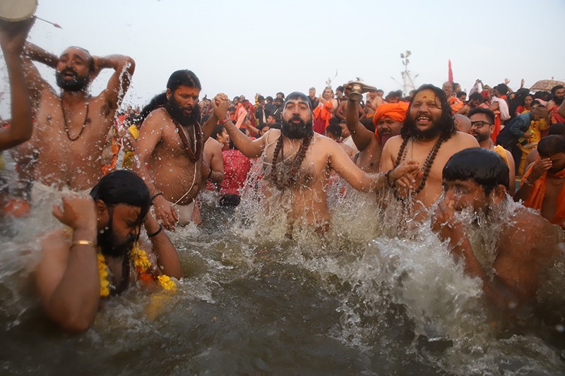 Maha Kumbh 2025: Naga sadhus steal the show on Triveni bank