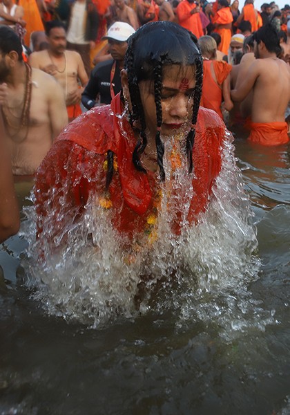 Maha Kumbh 2025: Naga sadhus steal the show on Triveni bank