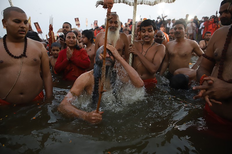 Maha Kumbh 2025: Naga sadhus steal the show on Triveni bank